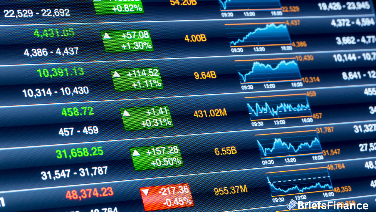 A digital screen displays financial market data with stock prices, green and red arrows indicating changes, and line graphs showing trends.
